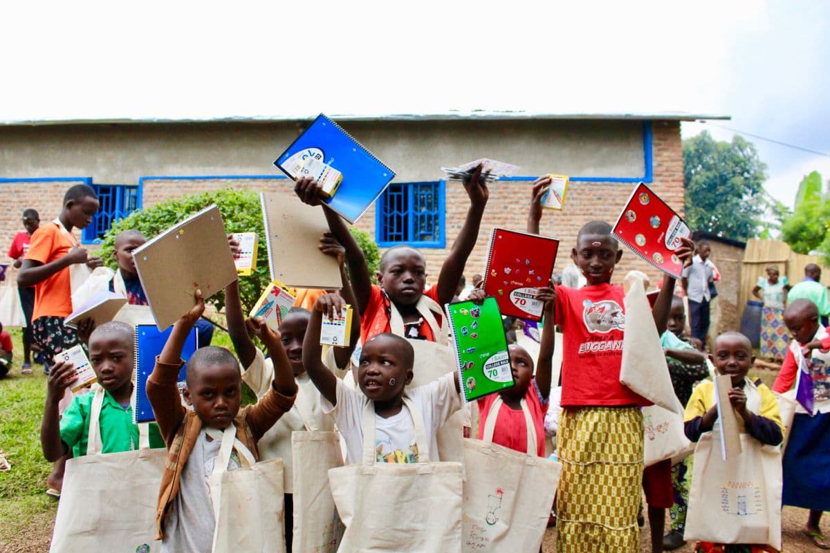 Kids sorting donated books and toys