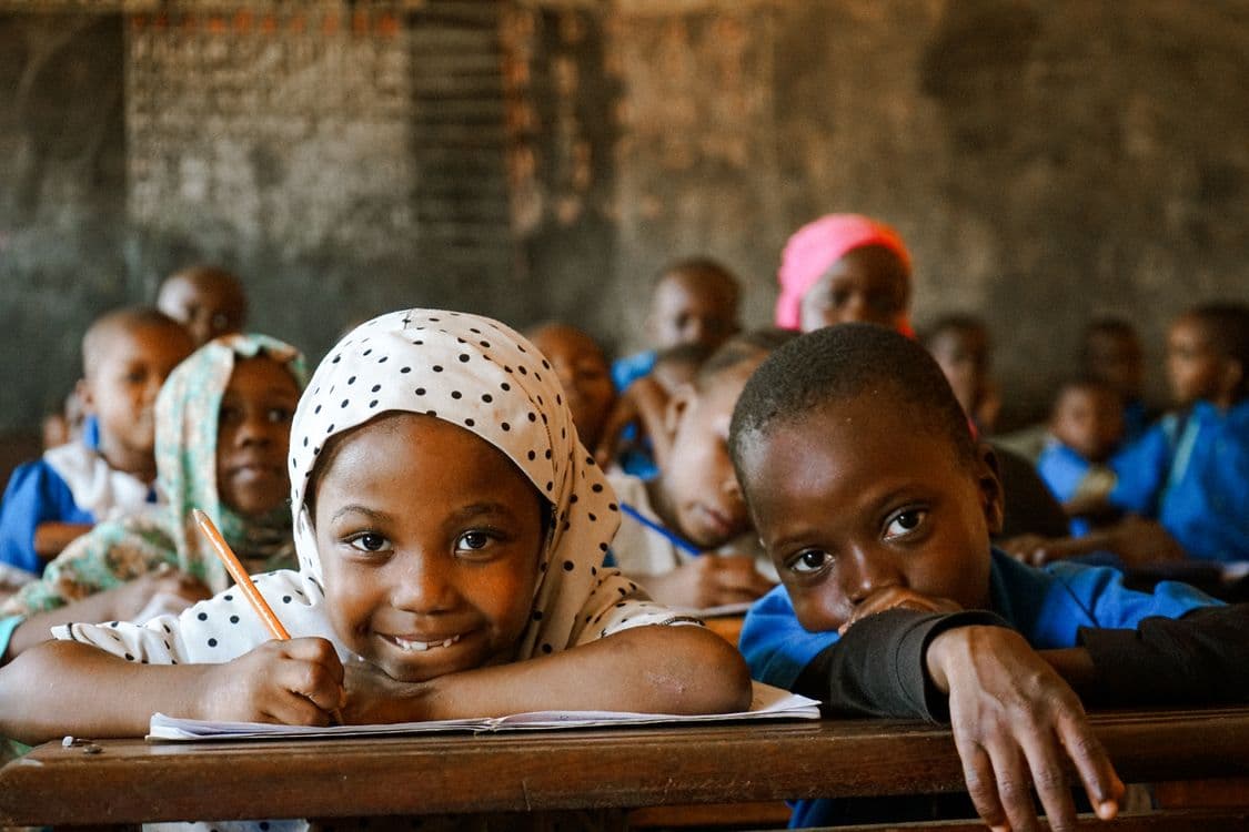 African child learning with joy